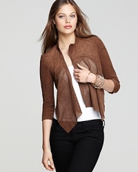 Perforated details lend sporty cool to this BCBGMAXAZRIA jacket, cut in a hyper-modern asymmetrical silhouette. Perforated details lend sporty cool to this BCBGMAXAZRIA jacket, cut in a hyper-modern asymmetrical silhouette.