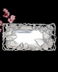Invite fresh whimsy to the table on the wings of the Butterfly bread tray. This springtime motif from Arthur Court serveware and serving dishes is swarming with butterflies, sculpted in gleaming aluminum--a delight for nature lovers. Invite fresh whimsy to the table on the wings of the Butterfly bread tray. This springtime motif from Arthur Court serveware and serving dishes is swarming with butterflies, sculpted in gleaming aluminum--a delight for nature lovers.