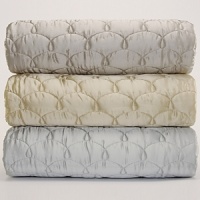 Dress your bed in luxury with the Barbara Barry Dream Silk collection. This shimmering silk european sham features quilted stitching detail. Dress your bed in luxury with the Barbara Barry Dream Silk collection. This shimmering silk european sham features quilted stitching detail.