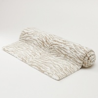 The call of the wild! Luxe bath rug made from a plush cotton. Fashioned in an exotic zebra print to liven up the bath area. The call of the wild! Luxe bath rug made from a plush cotton. Fashioned in an exotic zebra print to liven up the bath area.
