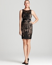 An illusion neckline and sheer back lend an alluring look to this Sue Wong dress, crafted in embellished mesh with sumptuous satin details. An illusion neckline and sheer back lend an alluring look to this Sue Wong dress, crafted in embellished mesh with sumptuous satin details.