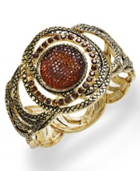 A sophisticated swirl of topaz-hued glass stones create a chic bracelet from Style&co. Stretches to fit wrist. Crafted in antiqued gold tone mixed metal. Approximate length: 7-1/2 inches. A sophisticated swirl of topaz-hued glass stones create a chic bracelet from Style&co. Stretches to fit wrist. Crafted in antiqued gold tone mixed metal. Approximate length: 7-1/2 inches.