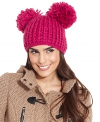 Have some fun when the cold weather sets in with this playful knit hat from Collection XIIX that's topped off with two pretty pom poms. Have some fun when the cold weather sets in with this playful knit hat from Collection XIIX that's topped off with two pretty pom poms.