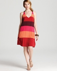 Delectable stripes on a silk BCBGMAXAZRIA dress imbue your capsule collection with an energetic spirit, while neutral accents lend a refined finish. Delectable stripes on a silk BCBGMAXAZRIA dress imbue your capsule collection with an energetic spirit, while neutral accents lend a refined finish.