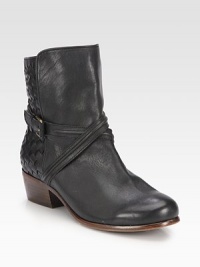 This street-ready leather boot is upgraded with an intricate basket weave pattern and raised heel. Stacked heel, 1¾ (45mm)Shaft, 6Leg circumference, 10Leather upperPull-on style with adjustable buckle strapLeather lining and solePadded insoleImported This street-ready leather boot is upgraded with an intricate basket weave pattern and raised heel. Stacked heel, 1¾ (45mm)Shaft, 6Leg circumference, 10Leather upperPull-on style with adjustable buckle strapLeather lining and solePadded insoleImported