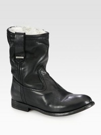 Expertly crafted in Italy, this timeless leather favorite is lined with warm shearling for superior comfort. Stacked heel, 1 (25mm)Shaft, 8Leg circumference, 11Leather upperPull-on styleShearling liningLeather solePadded insoleMade in Italy Expertly crafted in Italy, this timeless leather favorite is lined with warm shearling for superior comfort. Stacked heel, 1 (25mm)Shaft, 8Leg circumference, 11Leather upperPull-on styleShearling liningLeather solePadded insoleMade in Italy