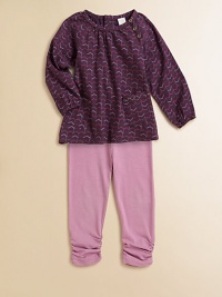 The season's must-have peasant top features front button detail, front patch pockets and a colorful zig-zag print with matching leggings.Round necklineLong sleeves with elastic cuffsBack snapsPatch pockets Leggings Elastic waistbandRuched hemCottonMachine washImported Please note: Number of snaps may vary depending on size ordered. The season's must-have peasant top features front button detail, front patch pockets and a colorful zig-zag print with matching leggings.Round necklineLong sleeves with elastic cuffsBack snapsPatch pockets Leggings Elastic waistbandRuched hemCottonMachine washImported Please note: Number of snaps may vary depending on size ordered.