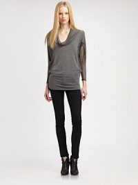 Unexpected mesh panels embolden this lengthy, supremely soft cowlneck. CowlneckDropped shouldersThree-quarter sleeves with mesh panelsLonger length hits below the hips96% rayon/4% spandexHand washMade in USAModel shown is 5'10 (177cm) wearing US size Small. Unexpected mesh panels embolden this lengthy, supremely soft cowlneck. CowlneckDropped shouldersThree-quarter sleeves with mesh panelsLonger length hits below the hips96% rayon/4% spandexHand washMade in USAModel shown is 5'10 (177cm) wearing US size Small.