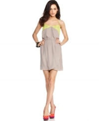 Neon colorblocking add a stylish edge to this BCBGeneration dress -- pop it with brights for a standout summer look! Neon colorblocking add a stylish edge to this BCBGeneration dress -- pop it with brights for a standout summer look!