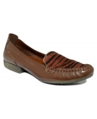 Animal prints adorn only the vamp of Baretraps' Adana flats for a look that's at once sophisticated and funky. Animal prints adorn only the vamp of Baretraps' Adana flats for a look that's at once sophisticated and funky.