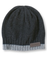 A rugged wool beanie with a look that harks back to the handmade, from Tommy Hilfiger. A rugged wool beanie with a look that harks back to the handmade, from Tommy Hilfiger.