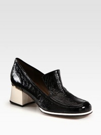 Traditional loafer-inspired pump in crinkled patent leather with a moderate block heel. Self-covered heel with metal insert, 2 (50mm)Crinkled patent leather upperLeather lining and solePadded insoleMade in Italy Traditional loafer-inspired pump in crinkled patent leather with a moderate block heel. Self-covered heel with metal insert, 2 (50mm)Crinkled patent leather upperLeather lining and solePadded insoleMade in Italy