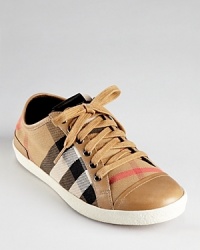 Burberry house-check sneakers are comfortable-chic with leather-trimmed canvas and heritage style. Burberry house-check sneakers are comfortable-chic with leather-trimmed canvas and heritage style.