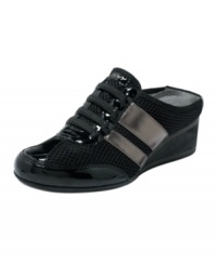 Slip into some of the cutest mules you'll ever own. DKNYC's Remedy mule wedges are shiny with sporty stripes on the sides. Slip into some of the cutest mules you'll ever own. DKNYC's Remedy mule wedges are shiny with sporty stripes on the sides.