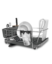 What a drain-simply clean your dishes & this innovative rack does the rest with a swivel spout that directs excess water straight to the sink with a unique wave-shaped edge that holds utensils and cutting boards upright for a quick drip dry. The rust- and corrosion-resistant construction keeps up with the wear and tear of the kitchen and features an extra large utensil holder and natural bamboo knife block. 5-year warranty. What a drain-simply clean your dishes & this innovative rack does the rest with a swivel spout that directs excess water straight to the sink with a unique wave-shaped edge that holds utensils and cutting boards upright for a quick drip dry. The rust- and corrosion-resistant construction keeps up with the wear and tear of the kitchen and features an extra large utensil holder and natural bamboo knife block. 5-year warranty.