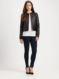 A softly quilted pattern and gathered elastic cuffs and hem add a polished look to this sumptuous leather jacket.JewelneckLong sleeves with elastic cuffsFront-zipFront flap pocketsElastic hemAbout 21 from shoulder to hemLeatherDry cleanImportedModel shown is 5'10 (177cm) wearing US size 4. A softly quilted pattern and gathered elastic cuffs and hem add a polished look to this sumptuous leather jacket.JewelneckLong sleeves with elastic cuffsFront-zipFront flap pocketsElastic hemAbout 21 from shoulder to hemLeatherDry cleanImportedModel shown is 5'10 (177cm) wearing US size 4.