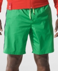 Designed to draw out your inner competitor, this lightweight swim trunk in quick-drying, chlorine-resistant polyester defines smart, athletic style. Designed to draw out your inner competitor, this lightweight swim trunk in quick-drying, chlorine-resistant polyester defines smart, athletic style.