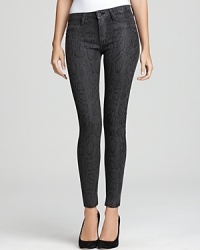 These Hudson skinny jeans go wild with an ever-so-subtle snakeskin print. These Hudson skinny jeans go wild with an ever-so-subtle snakeskin print.