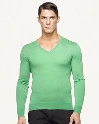 Luxuriously jersey-knit from soft cashmere yarns and tailored for a trim fit, this long-sleeved V-neck easily elevates any look. Luxuriously jersey-knit from soft cashmere yarns and tailored for a trim fit, this long-sleeved V-neck easily elevates any look.