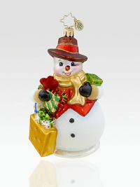 Add a little glitz to the tree with this glittered glass ornament featuring a snowy shopper handpainted in rich reds and golds.Mouthblown, handpainted glass 5¼ high Made in Poland Add a little glitz to the tree with this glittered glass ornament featuring a snowy shopper handpainted in rich reds and golds.Mouthblown, handpainted glass 5¼ high Made in Poland