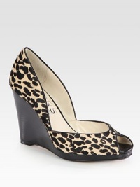 A sturdy wedge lifts this fierce peep toe design of leopard-print calf hair with smooth leather trim. Stacked wedge, 3¾ (95mm)Stacked platform, ¾ (20mm)Compares to a 3 heel (75mm)Leopard-print calf hair upper with leather trimPeep toeLeather lining and solePadded insoleImportedOUR FIT MODEL RECOMMENDS ordering true size. A sturdy wedge lifts this fierce peep toe design of leopard-print calf hair with smooth leather trim. Stacked wedge, 3¾ (95mm)Stacked platform, ¾ (20mm)Compares to a 3 heel (75mm)Leopard-print calf hair upper with leather trimPeep toeLeather lining and solePadded insoleImportedOUR FIT MODEL RECOMMENDS ordering true size.