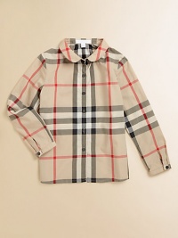 Timeless Peter Pan collar and classic check pattern on a plush cotton button-down design.Peter Pan collarLong sleeves with button tab cuffsButton-frontCottonMachine washImported