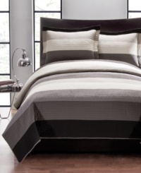 Simple and sophisticated, this hand-pieced Charcoal Modern quilt set boasts lush texture and broad bands in cool shades of grey. Simple and sophisticated, this hand-pieced Charcoal Modern quilt set boasts lush texture and broad bands in cool shades of grey.