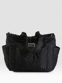 Signature stitching on printed nylon, crafted in a stylish, functional tote for all your baby necessities.Double top handles, 8½ dropRemovable adjustable shoulder strap, 19-24 dropTop zip closureFour outside open pocketsOne inside zip pocketFour inside open pocketsChanging pad includedFully lined16½W X 13½H X 5¼DImported Signature stitching on printed nylon, crafted in a stylish, functional tote for all your baby necessities.Double top handles, 8½ dropRemovable adjustable shoulder strap, 19-24 dropTop zip closureFour outside open pocketsOne inside zip pocketFour inside open pocketsChanging pad includedFully lined16½W X 13½H X 5¼DImported