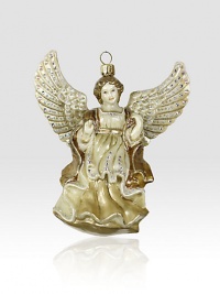 From the Jay Strongwater Angelic collection a palette of creams, golds and silver accents have been painted on this finely detailed Angel Glass Ornament. GlassCrystalHandmade, hand-painted and hand-set5.5H X 5.75W X 2.5DImported From the Jay Strongwater Angelic collection a palette of creams, golds and silver accents have been painted on this finely detailed Angel Glass Ornament. GlassCrystalHandmade, hand-painted and hand-set5.5H X 5.75W X 2.5DImported