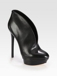 Channel downtown vibes with this low-cut leather ankle boot, heightened by a commanding heel and platform. Self-covered heel, 6 (150mm)Covered island platform, 1½ (40mm)Compares to a 4½ heel (115mm)Leather upperPull-on styleLeather lining and solePadded insoleImportedOUR FIT MODEL RECOMMENDS ordering true size. Channel downtown vibes with this low-cut leather ankle boot, heightened by a commanding heel and platform. Self-covered heel, 6 (150mm)Covered island platform, 1½ (40mm)Compares to a 4½ heel (115mm)Leather upperPull-on styleLeather lining and solePadded insoleImportedOUR FIT MODEL RECOMMENDS ordering true size.