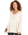 Be a bohemian beauty in Lucky Brand Jeans' plus size peasant top, accented by charming cutouts.