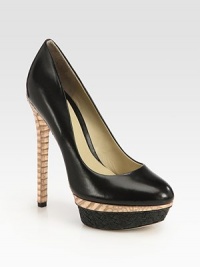 A textured raffia platform takes this leather pump with metallic snake-print accents to new style heights. Metallic snake-print leather heel, 5¾ (145mm)Raffia platform with metallic snake-print leather insert, 1¾ (45mm)Compares to a 4 heel (100mm)Leather upperLeather lining and solePadded insoleImported A textured raffia platform takes this leather pump with metallic snake-print accents to new style heights. Metallic snake-print leather heel, 5¾ (145mm)Raffia platform with metallic snake-print leather insert, 1¾ (45mm)Compares to a 4 heel (100mm)Leather upperLeather lining and solePadded insoleImported