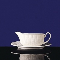 This eclectic service with its beautifully-detailed basket-style relief is an everyday white china for those who appreciate the unique. Bone china. This eclectic service with its beautifully-detailed basket-style relief is an everyday white china for those who appreciate the unique. Bone china.