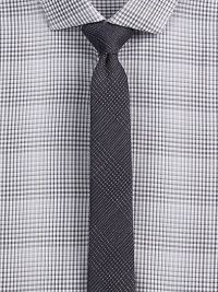 Textured, check-print pattern defines a handsomely woven tie made from Italian silk.About 2 wide60% wool/40% silkDry cleanMade in Italy Textured, check-print pattern defines a handsomely woven tie made from Italian silk.About 2 wide60% wool/40% silkDry cleanMade in Italy