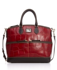 Two handy front pockets add zip to the glossy croc-embossed patent leather satchel by Dooney & Bourke.