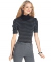 Style&co. adds a feminine twist to this houndstooth turtleneck with ruched sleeves. (Clearance)