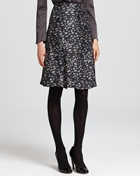 Uptown sophistication arrives with this gorgeous printed Armani Collezioni skirt featuring subtle pleats on a classic A-line silhouette for everyday elegance. Uptown sophistication arrives with this gorgeous printed Armani Collezioni skirt featuring subtle pleats on a classic A-line silhouette for everyday elegance.