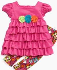 Flower power! She'll feel groovy all day long in this vibrant dress and legging set from Sweet Heart Rose. Flower power! She'll feel groovy all day long in this vibrant dress and legging set from Sweet Heart Rose.