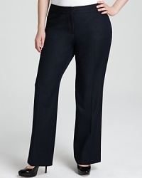 Cut a sharp silhouette in these Tahari Woman Plus black pants. Style with polished pumps and a jewel-tone blouse for corner-office chic. Cut a sharp silhouette in these Tahari Woman Plus black pants. Style with polished pumps and a jewel-tone blouse for corner-office chic.