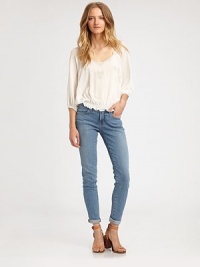 Held in place by an elasticized hem, this semi-sheer silk top has delicate embroidery, three-quarter bishop sleeves and buttons that make their way up the back. ScoopneckThree-quarter bishop sleevesElasticized hemScoopbackBack button closuresSilkDry cleanImportedModel shown is 5'10 (177cm) wearing US size Small. Held in place by an elasticized hem, this semi-sheer silk top has delicate embroidery, three-quarter bishop sleeves and buttons that make their way up the back. ScoopneckThree-quarter bishop sleevesElasticized hemScoopbackBack button closuresSilkDry cleanImportedModel shown is 5'10 (177cm) wearing US size Small.