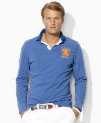 An essential long-sleeved rugby shirt is cut for a trim, modern fit from antiqued cotton jersey and embroidered with signature sporty details for vintage-inspired athleticism. An essential long-sleeved rugby shirt is cut for a trim, modern fit from antiqued cotton jersey and embroidered with signature sporty details for vintage-inspired athleticism.