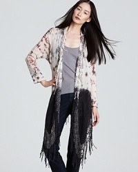 Embark on a quest to traveler-chic in this XCVI cardigan boasting a modern mix of textures, tones and prints for the endless fashion trip. Embark on a quest to traveler-chic in this XCVI cardigan boasting a modern mix of textures, tones and prints for the endless fashion trip.