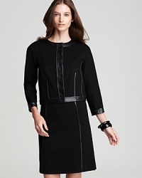 Define urban design in this DKNY jacket. Leather trim accentuates the sculptural silhouette for a sharp, strong approach to your workweek repertoire. Define urban design in this DKNY jacket. Leather trim accentuates the sculptural silhouette for a sharp, strong approach to your workweek repertoire.