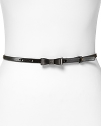 Add a cheeky twist to everyday ensembles with a whimsical bow belt from Tory Burch. Add a cheeky twist to everyday ensembles with a whimsical bow belt from Tory Burch.