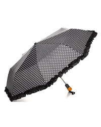 With polka dots and a ruffle trim, Bloomingdale's umbrella adds a shot of retro glamour to your rainy day look. With polka dots and a ruffle trim, Bloomingdale's umbrella adds a shot of retro glamour to your rainy day look.