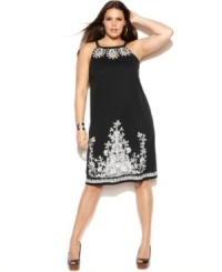 Flash a hint of skin with INC's halter plus size dress, accented by alluring keyholes. Flash a hint of skin with INC's halter plus size dress, accented by alluring keyholes.