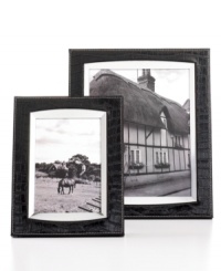 Show everyone your wild side. With silver trim and white stitching, the Faux Croc picture frame lends a touch of the exotic to your home gallery. From Leeber. Show everyone your wild side. With silver trim and white stitching, the Faux Croc picture frame lends a touch of the exotic to your home gallery. From Leeber.