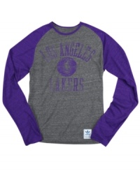 Rush the court! Be a part of the team victory with this Los Angeles Lakers NBA raglan shirt from adidas. Rush the court! Be a part of the team victory with this Los Angeles Lakers NBA raglan shirt from adidas.
