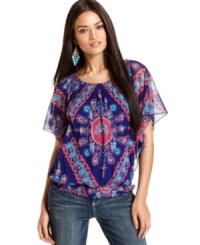 A bold print on a peasant-style blouse gives this petite INC top stylish flair. Pair with your favorite jeans and dangly accessories and voila -- a trendy outfit is born! A bold print on a peasant-style blouse gives this petite INC top stylish flair. Pair with your favorite jeans and dangly accessories and voila -- a trendy outfit is born!