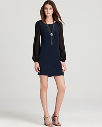 Part retro, part of-the moment, this ERIN Erin Fetherston dress boasts a sleek shift silhouette accentuated by finely pleated chiffon sleeves. Part retro, part of-the moment, this ERIN Erin Fetherston dress boasts a sleek shift silhouette accentuated by finely pleated chiffon sleeves.